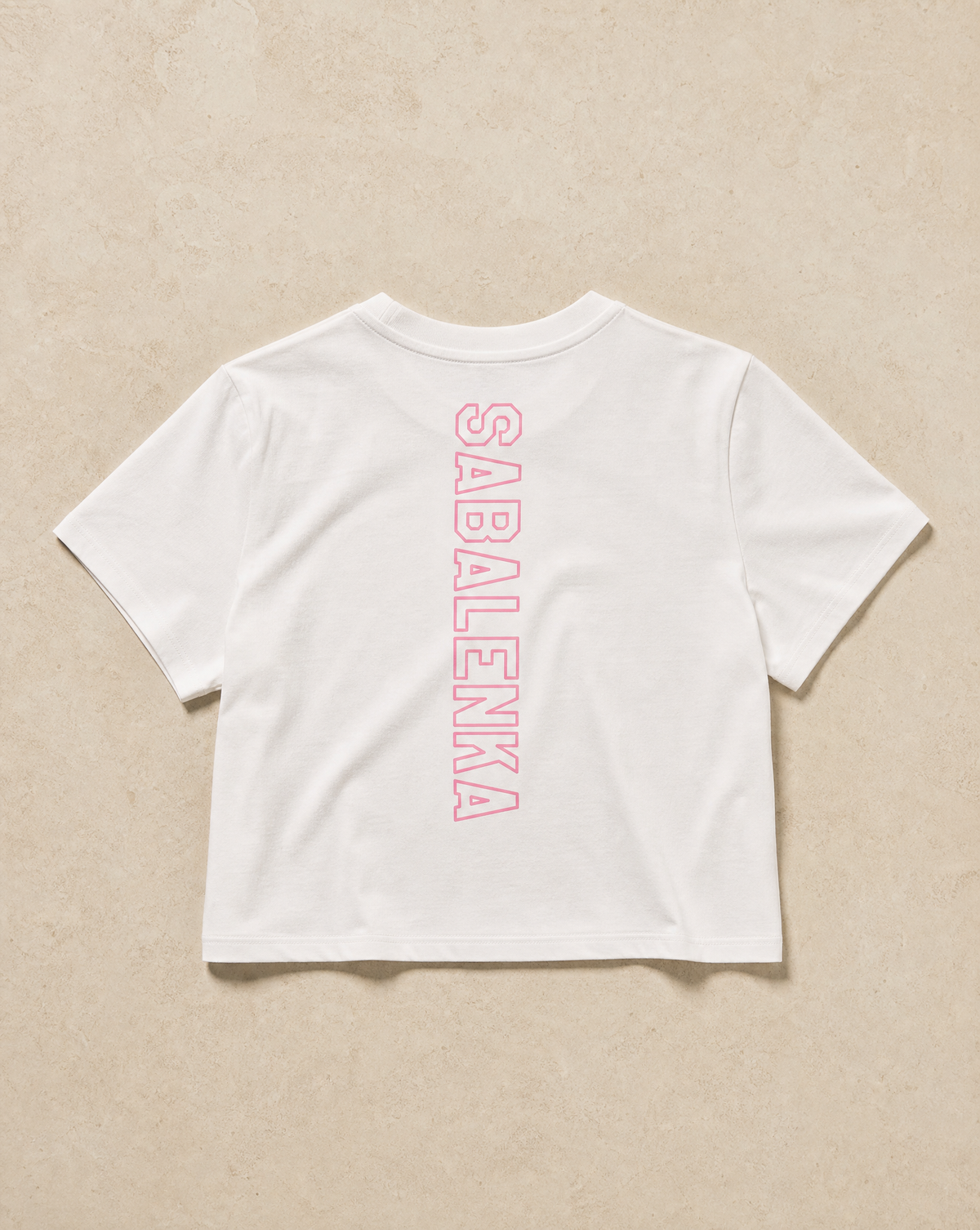 Back view of Fanagerie Serve and Win Ladies Suite Tee Cropped SS — Aryna Sabalenka
